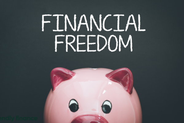 A piggy bank with "financial freedom" written above it