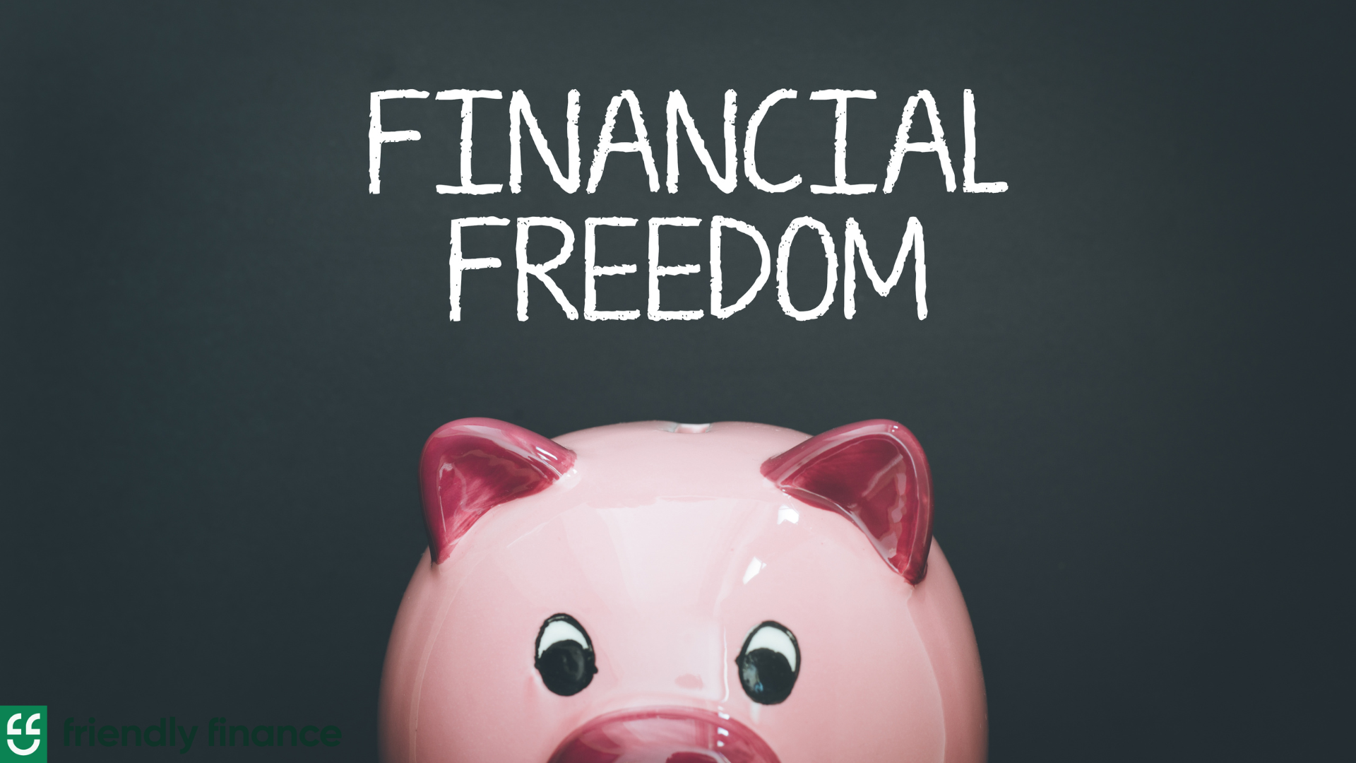 A piggy bank with "financial freedom" written above it